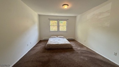 Relax in this updated end-unit, lakefront townhome offering a on High Point Golf Club in New Jersey - for sale on GolfHomes.com, golf home, golf lot