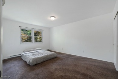 Relax in this updated end-unit, lakefront townhome offering a on High Point Golf Club in New Jersey - for sale on GolfHomes.com, golf home, golf lot