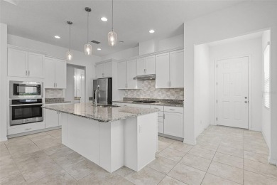 Welcome to this lovely villa nestled in the stunning 55+ on Mystic Dunes Resort and Golf Club in Florida - for sale on GolfHomes.com, golf home, golf lot