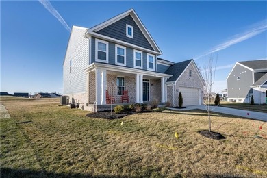 STUNNING HOME IN CHAMPIONS POINTE, LESS THAN ONE YEAR OLD! This on Champions Pointe Golf Course in Indiana - for sale on GolfHomes.com, golf home, golf lot