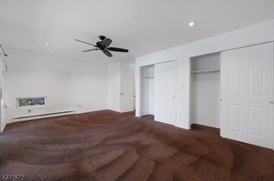 Relax in this updated end-unit, lakefront townhome offering a on High Point Golf Club in New Jersey - for sale on GolfHomes.com, golf home, golf lot