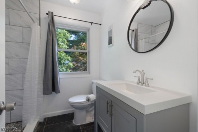 Relax in this updated end-unit, lakefront townhome offering a on High Point Golf Club in New Jersey - for sale on GolfHomes.com, golf home, golf lot