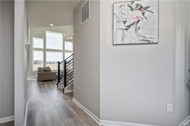 STUNNING HOME IN CHAMPIONS POINTE, LESS THAN ONE YEAR OLD! This on Champions Pointe Golf Course in Indiana - for sale on GolfHomes.com, golf home, golf lot