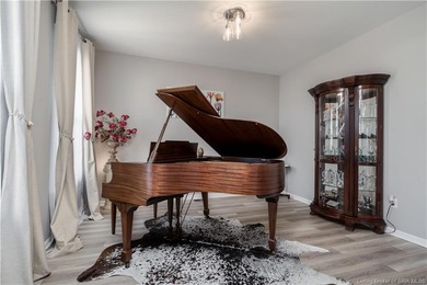 STUNNING HOME IN CHAMPIONS POINTE, LESS THAN ONE YEAR OLD! This on Champions Pointe Golf Course in Indiana - for sale on GolfHomes.com, golf home, golf lot