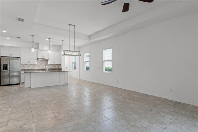 Welcome to this lovely villa nestled in the stunning 55+ on Mystic Dunes Resort and Golf Club in Florida - for sale on GolfHomes.com, golf home, golf lot