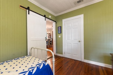 This adorable cottage is full of charm from the inviting front on The Bridges Golf Club At Hollywood Casino in Mississippi - for sale on GolfHomes.com, golf home, golf lot