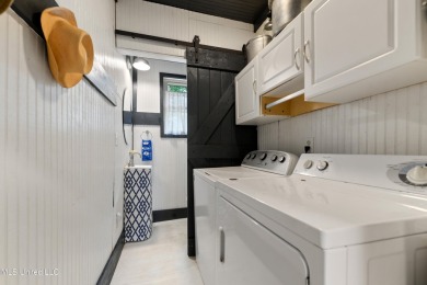 This adorable cottage is full of charm from the inviting front on The Bridges Golf Club At Hollywood Casino in Mississippi - for sale on GolfHomes.com, golf home, golf lot