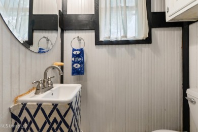 This adorable cottage is full of charm from the inviting front on The Bridges Golf Club At Hollywood Casino in Mississippi - for sale on GolfHomes.com, golf home, golf lot