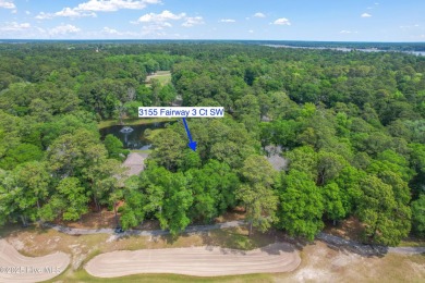 Lovely wooded lot along Fairway #3 in Lockwood Folly Country on Lockwood Folly Country Club in North Carolina - for sale on GolfHomes.com, golf home, golf lot