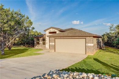 Stunning & stately brand new home on a quiet street in Lago on Highland Lakes Golf Course in Texas - for sale on GolfHomes.com, golf home, golf lot