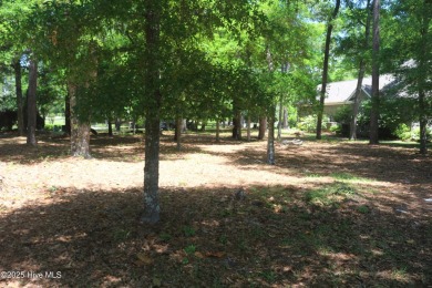 Lovely wooded lot along Fairway #3 in Lockwood Folly Country on Lockwood Folly Country Club in North Carolina - for sale on GolfHomes.com, golf home, golf lot