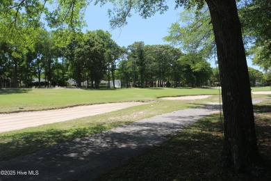 Lovely wooded lot along Fairway #3 in Lockwood Folly Country on Lockwood Folly Country Club in North Carolina - for sale on GolfHomes.com, golf home, golf lot