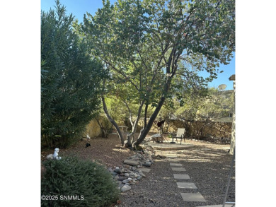 Charming Southwestern-style home, nestled in a cul-de-sac, is on Sonoma Ranch Golf Course in New Mexico - for sale on GolfHomes.com, golf home, golf lot