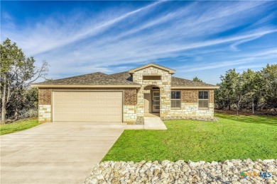 Stunning & stately brand new home on a quiet street in Lago on Highland Lakes Golf Course in Texas - for sale on GolfHomes.com, golf home, golf lot