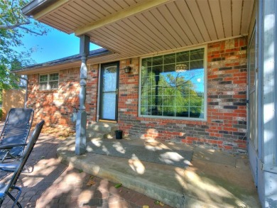 Large brick home backing up to Surrey Hills Golf Club! This 3 on Golf Club At Surrey Hills in Oklahoma - for sale on GolfHomes.com, golf home, golf lot