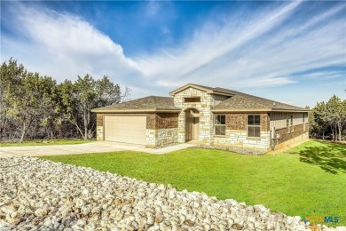 Stunning & stately brand new home on a quiet street in Lago on Highland Lakes Golf Course in Texas - for sale on GolfHomes.com, golf home, golf lot