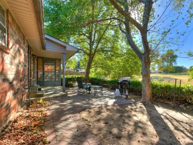 Large brick home backing up to Surrey Hills Golf Club! This 3 on Golf Club At Surrey Hills in Oklahoma - for sale on GolfHomes.com, golf home, golf lot