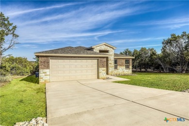 Stunning & stately brand new home on a quiet street in Lago on Highland Lakes Golf Course in Texas - for sale on GolfHomes.com, golf home, golf lot