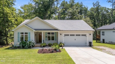 Competitively priced charming ranch style home w/  3 bed/2 bath on River Golf and County Club at Lake Royale in North Carolina - for sale on GolfHomes.com, golf home, golf lot