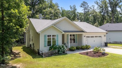Competitively priced charming ranch style home w/  3 bed/2 bath on River Golf and County Club at Lake Royale in North Carolina - for sale on GolfHomes.com, golf home, golf lot