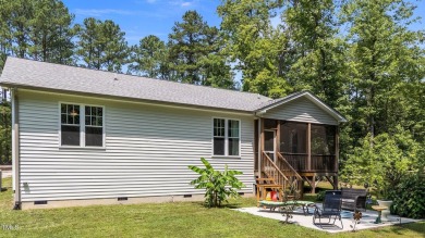 Competitively priced charming ranch style home w/  3 bed/2 bath on River Golf and County Club at Lake Royale in North Carolina - for sale on GolfHomes.com, golf home, golf lot