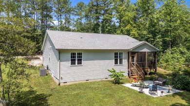 Competitively priced charming ranch style home w/  3 bed/2 bath on River Golf and County Club at Lake Royale in North Carolina - for sale on GolfHomes.com, golf home, golf lot
