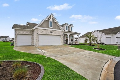Experience coastal luxury in this 2024-built Hickory floorplan on World Tour Golf Links in South Carolina - for sale on GolfHomes.com, golf home, golf lot