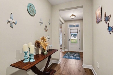 Experience coastal luxury in this 2024-built Hickory floorplan on World Tour Golf Links in South Carolina - for sale on GolfHomes.com, golf home, golf lot