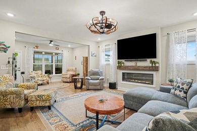 Experience coastal luxury in this 2024-built Hickory floorplan on World Tour Golf Links in South Carolina - for sale on GolfHomes.com, golf home, golf lot