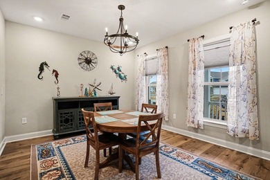 Experience coastal luxury in this 2024-built Hickory floorplan on World Tour Golf Links in South Carolina - for sale on GolfHomes.com, golf home, golf lot