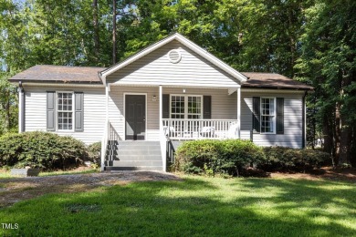 Discover your dream ranch home in this inviting lake community on River Golf and County Club at Lake Royale in North Carolina - for sale on GolfHomes.com, golf home, golf lot