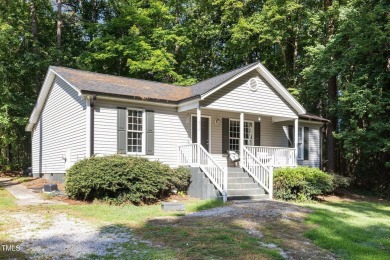 Discover your dream ranch home in this inviting lake community on River Golf and County Club at Lake Royale in North Carolina - for sale on GolfHomes.com, golf home, golf lot