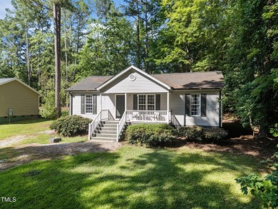Discover your dream ranch home in this inviting lake community on River Golf and County Club at Lake Royale in North Carolina - for sale on GolfHomes.com, golf home, golf lot
