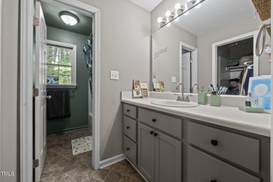 Discover your dream ranch home in this inviting lake community on River Golf and County Club at Lake Royale in North Carolina - for sale on GolfHomes.com, golf home, golf lot