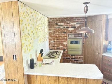 Perfect home for a project in a great location on a large lot! on Tucson Estates Golf Course in Arizona - for sale on GolfHomes.com, golf home, golf lot