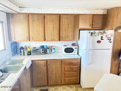 Perfect home for a project in a great location on a large lot! on Tucson Estates Golf Course in Arizona - for sale on GolfHomes.com, golf home, golf lot