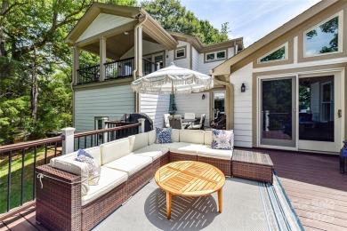 Spectacular Sunsets and Panoramic views of Lake Wylie's main on Tega Cay Golf Club in South Carolina - for sale on GolfHomes.com, golf home, golf lot
