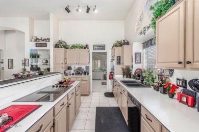 Meticulously cared for open floor plan with beautiful golf on Sun Village Golf Course in Arizona - for sale on GolfHomes.com, golf home, golf lot