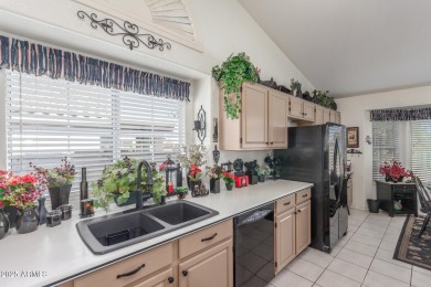 Meticulously cared for open floor plan with beautiful golf on Sun Village Golf Course in Arizona - for sale on GolfHomes.com, golf home, golf lot