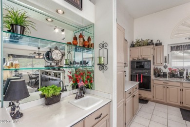 Meticulously cared for open floor plan with beautiful golf on Sun Village Golf Course in Arizona - for sale on GolfHomes.com, golf home, golf lot