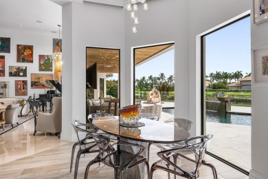 Perched on a rare, oversized lot at the end of a quiet on Boca Delray Golf and Country Club in Florida - for sale on GolfHomes.com, golf home, golf lot