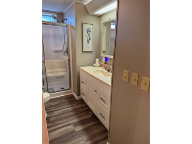 This stunning 2-bedroom, 2-bathroom home, including golf cart on Golden Lakes Golf Course in Florida - for sale on GolfHomes.com, golf home, golf lot