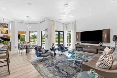 Perched on a rare, oversized lot at the end of a quiet on Boca Delray Golf and Country Club in Florida - for sale on GolfHomes.com, golf home, golf lot