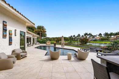 Perched on a rare, oversized lot at the end of a quiet on Boca Delray Golf and Country Club in Florida - for sale on GolfHomes.com, golf home, golf lot