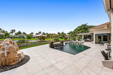 Perched on a rare, oversized lot at the end of a quiet on Boca Delray Golf and Country Club in Florida - for sale on GolfHomes.com, golf home, golf lot