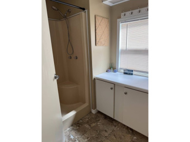 This stunning 2-bedroom, 2-bathroom home, including golf cart on Golden Lakes Golf Course in Florida - for sale on GolfHomes.com, golf home, golf lot