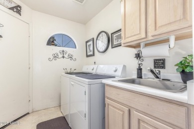 Meticulously cared for open floor plan with beautiful golf on Sun Village Golf Course in Arizona - for sale on GolfHomes.com, golf home, golf lot