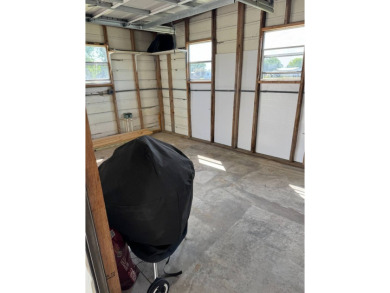 This stunning 2-bedroom, 2-bathroom home, including golf cart on Golden Lakes Golf Course in Florida - for sale on GolfHomes.com, golf home, golf lot