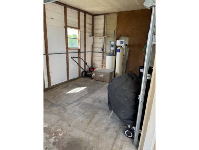 This stunning 2-bedroom, 2-bathroom home, including golf cart on Golden Lakes Golf Course in Florida - for sale on GolfHomes.com, golf home, golf lot