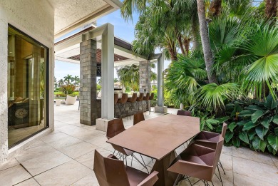 Perched on a rare, oversized lot at the end of a quiet on Boca Delray Golf and Country Club in Florida - for sale on GolfHomes.com, golf home, golf lot